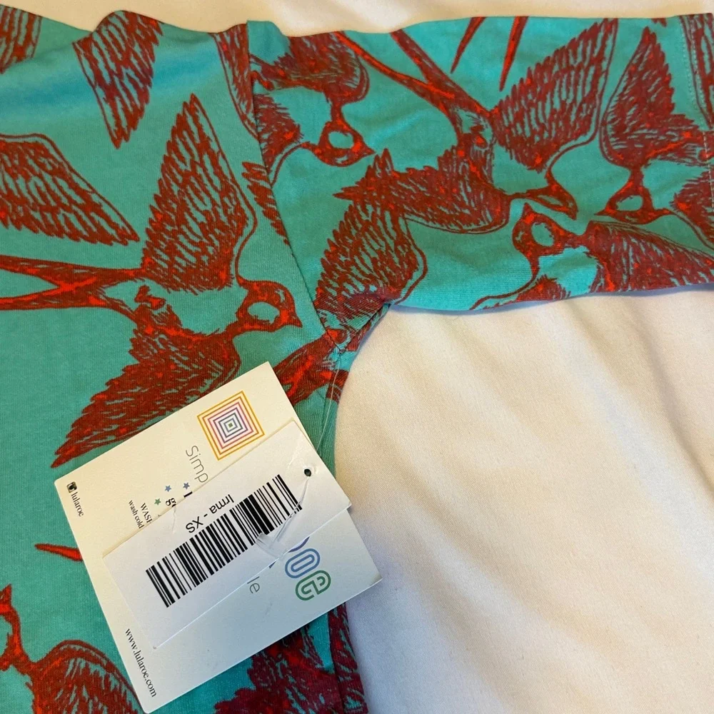 LuLaRoe Irma Teal and Red Patterned Top